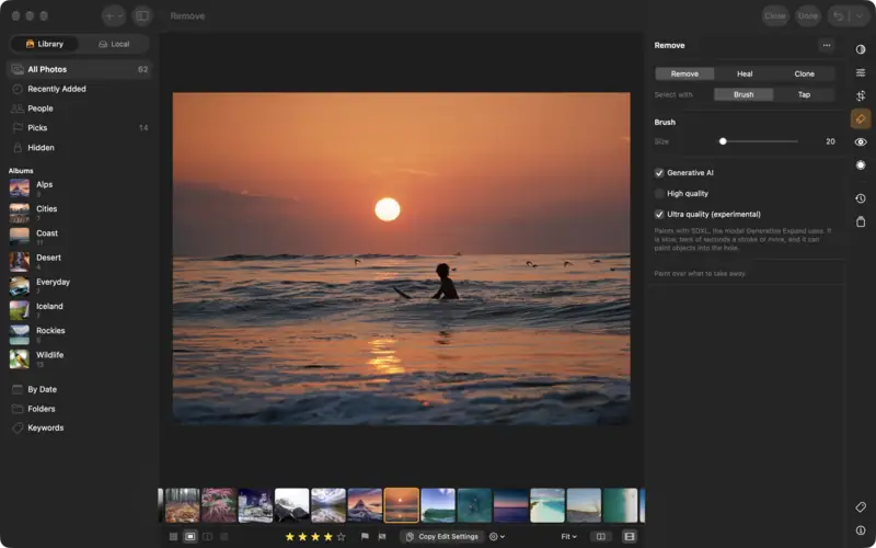 A surfer on a wave at sunset, open in Remove