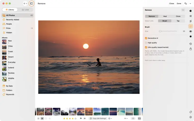 A surfer on a wave at sunset, open in Remove