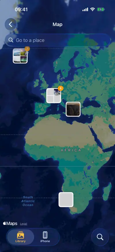 A map with groups of photos over Iceland, the Alps and North America